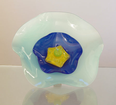 Large Light Blue Flower with Dark Blue, yellow and green Centres