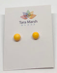 Opaque yellow dot stud earrings